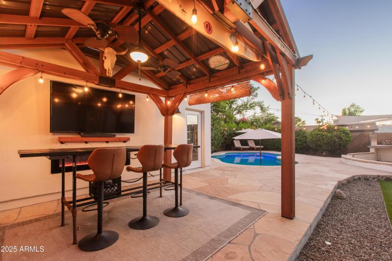 Pergola with Misters And Fireplace