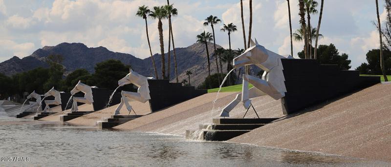 Equine gargoyles spouting water