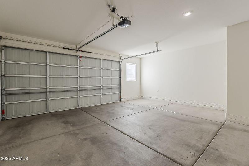 2 car garage PLUS extra half!