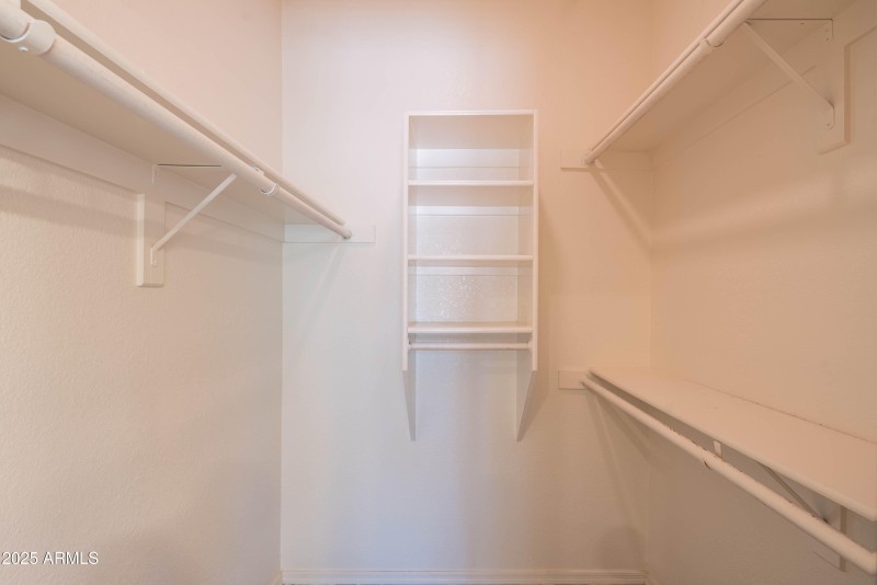 Closet in primary bedroom
