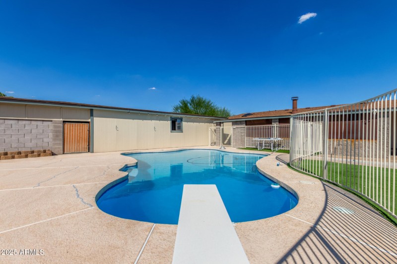 Pool looking toward detached garage