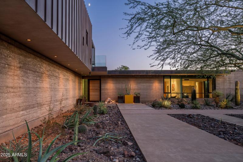 Rammed Earth and Copper elements