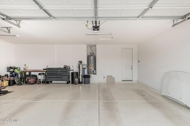 3 car garage view of 2 spots