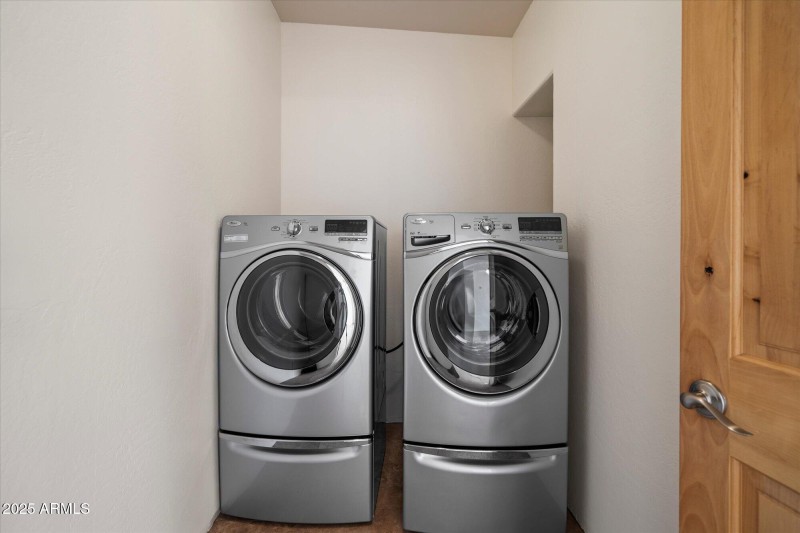 Inside spacious laundry