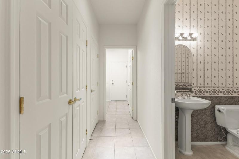 Bright Hallway with Modern Tile Floors