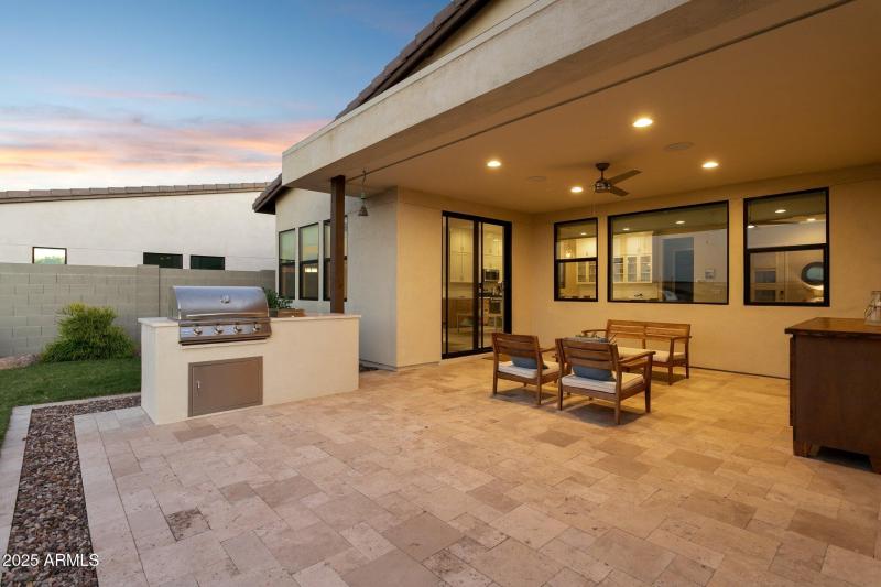 Built-in BBQ area off covered patio