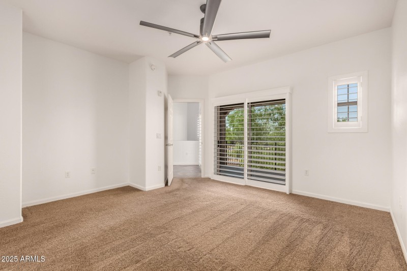 Primary Bedroom with Balcony