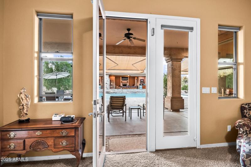 DOORS TO BACK PATIO FROM PRIMARY BEDROOM