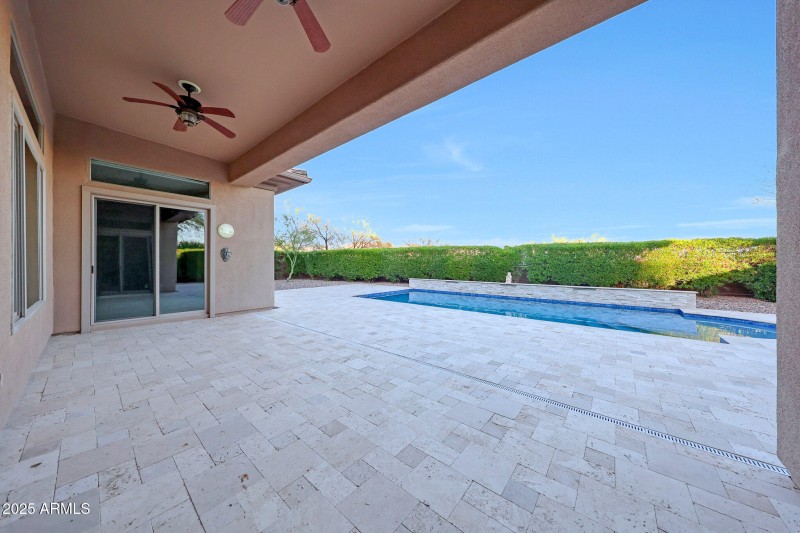 Covered patio wi room to dine & relax