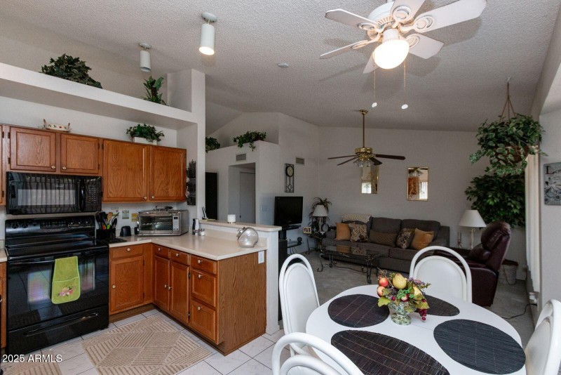 10345 n 62nd ave kitchen view of family