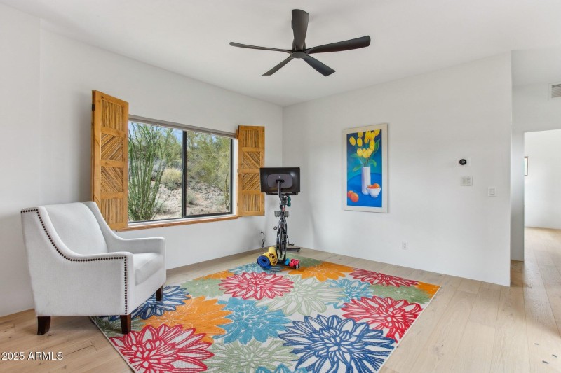 Living or exercise room off guest suite