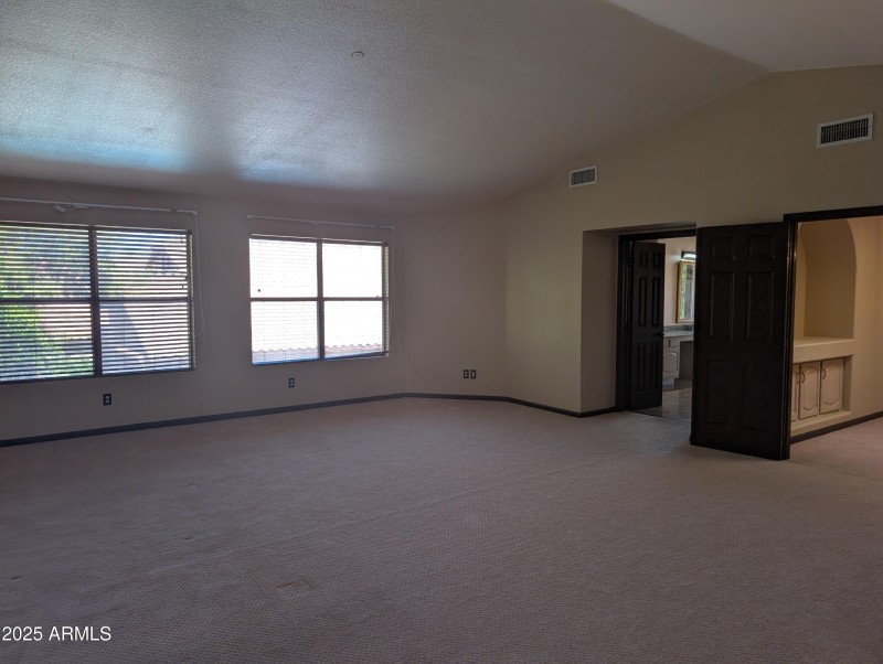 14 Primary bedroom leading into ensuite