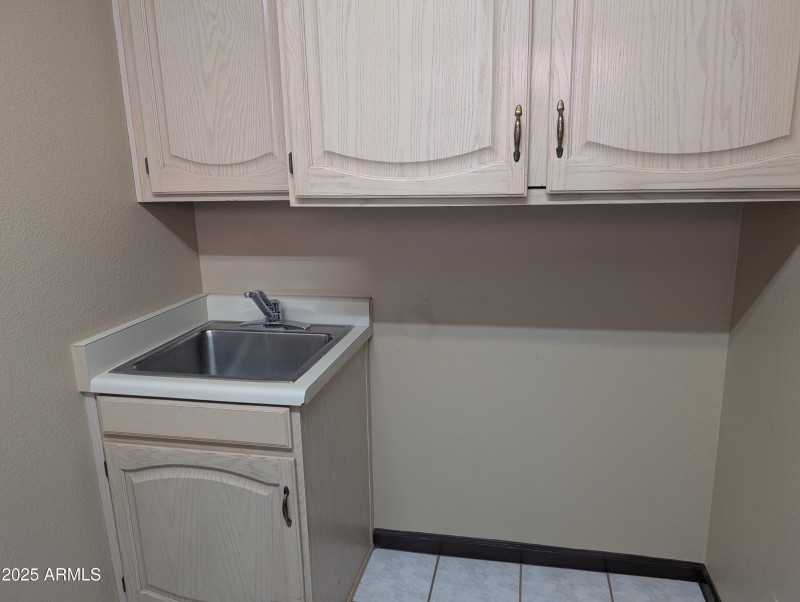 27 Utility sink inside laundry room