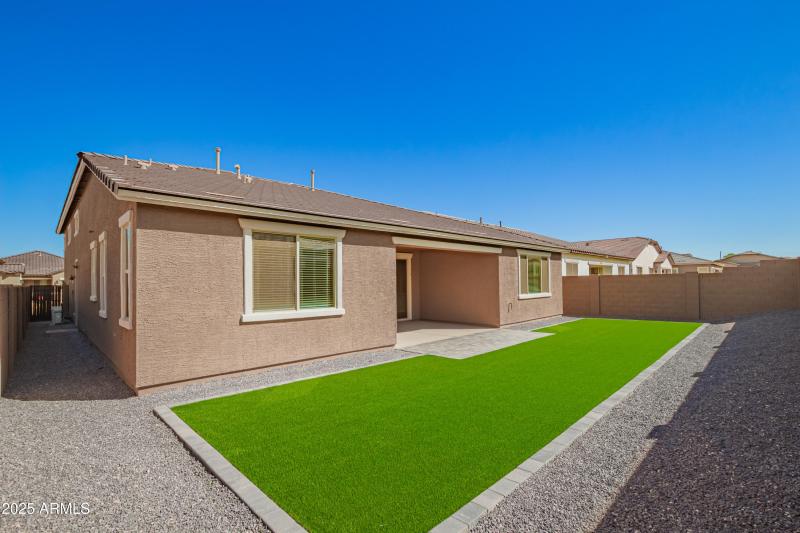 Spacious Backyard with Turf