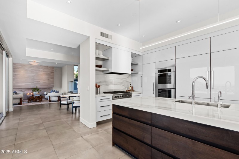 Kitchen around the corner from dining