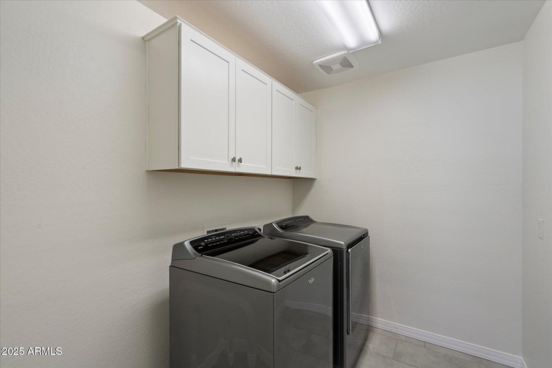 Upstairs Laundry Room w: Storage
