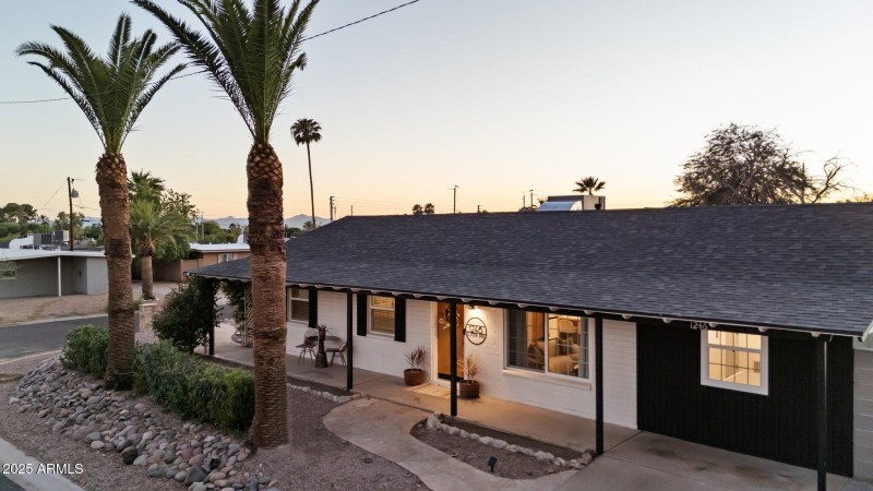 Porch runs length of home