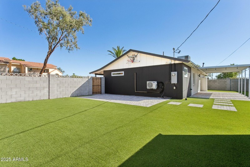 Expanses of lawn and paver patios