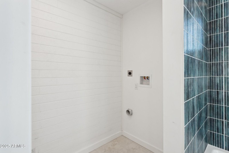 Convenient laundry in primary suite