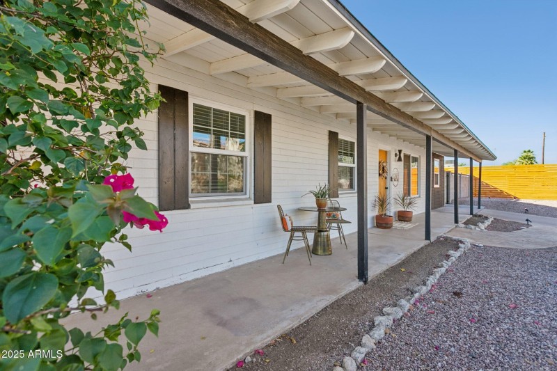 Front porch runs the length of the home