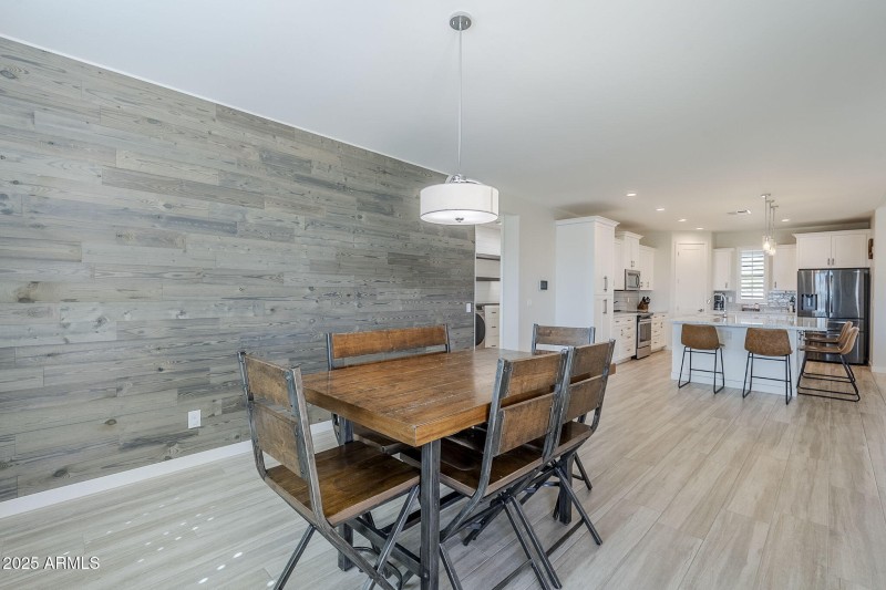Dining Room with Wood Feature Wall