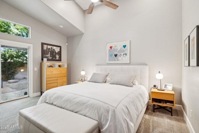 Primary bedroom opens to backyard