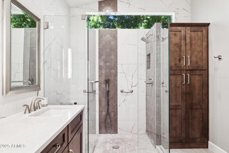 Shower with floor to ceiling tile