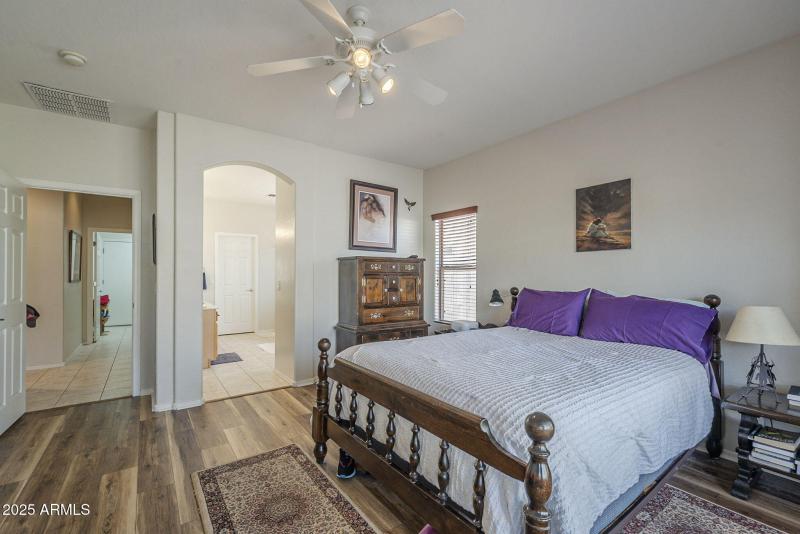 Primary bedroom view to the primary bath