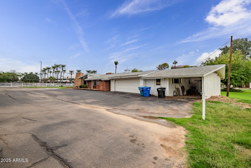 Two Car Garage with storage rooms and ca
