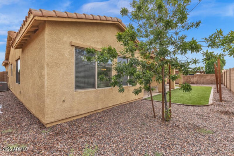 5704 S. 57TH DR SOLD MEDIA BACKYARD 2