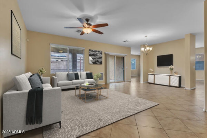 5704 S. 57TH DR SOLD MEDIA LIVING ROOM -