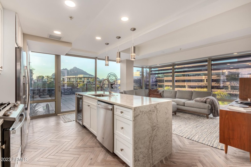 Herringbone tile floor throughout