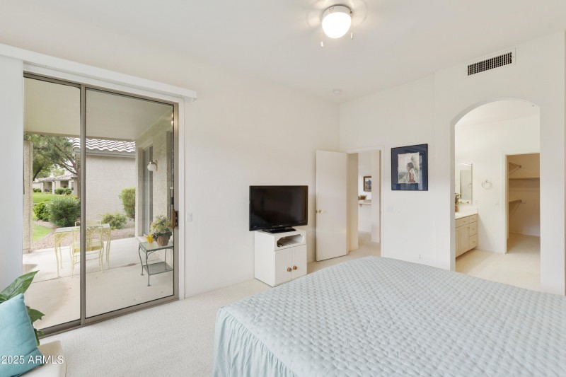 Primary Bedroom has patio access