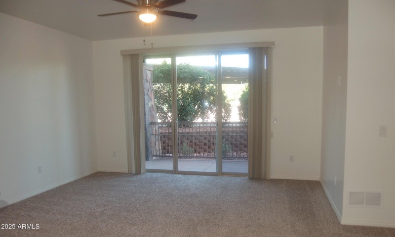 Deluxe 1 bed living room to patio