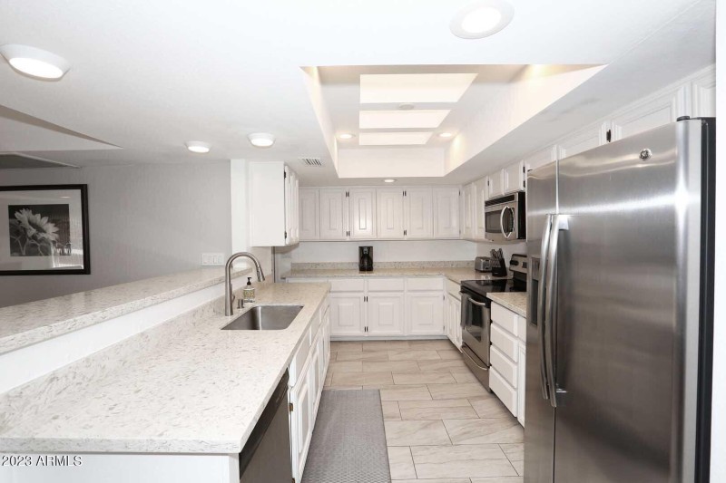 Kitchen opens to Family Room