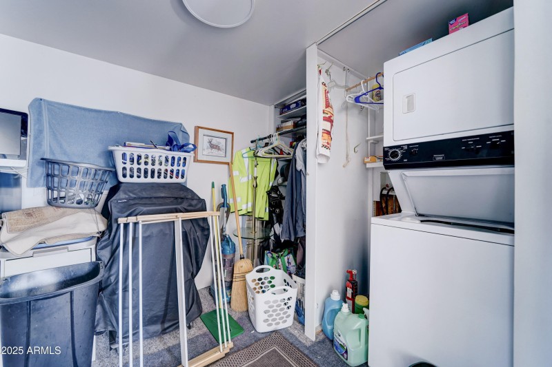 Stacking laundry in shed