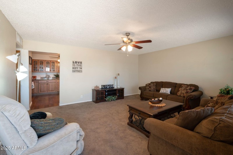 Living room looking into kitchen