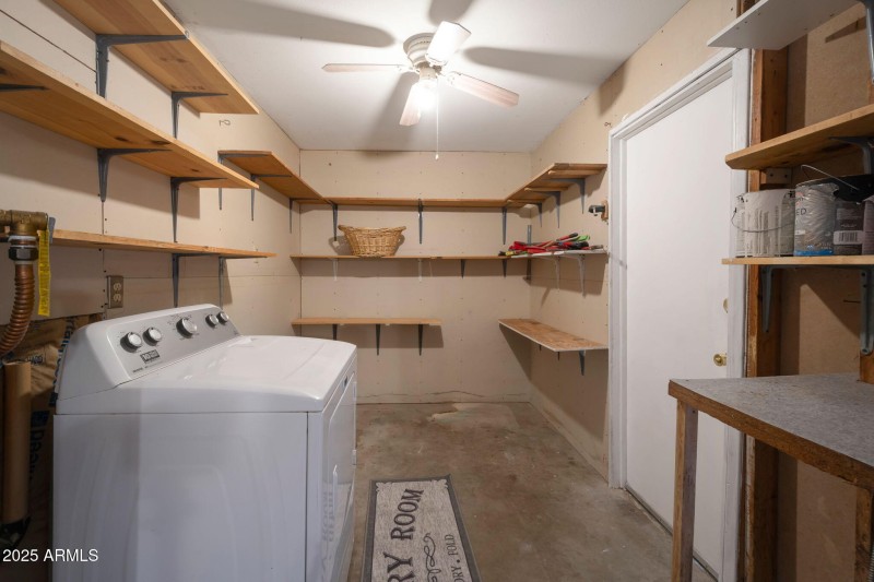 Laundry room with Lots of shelfs