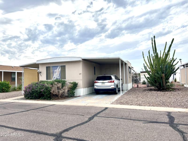 EXTERIOR 127 CARPORT SIDE