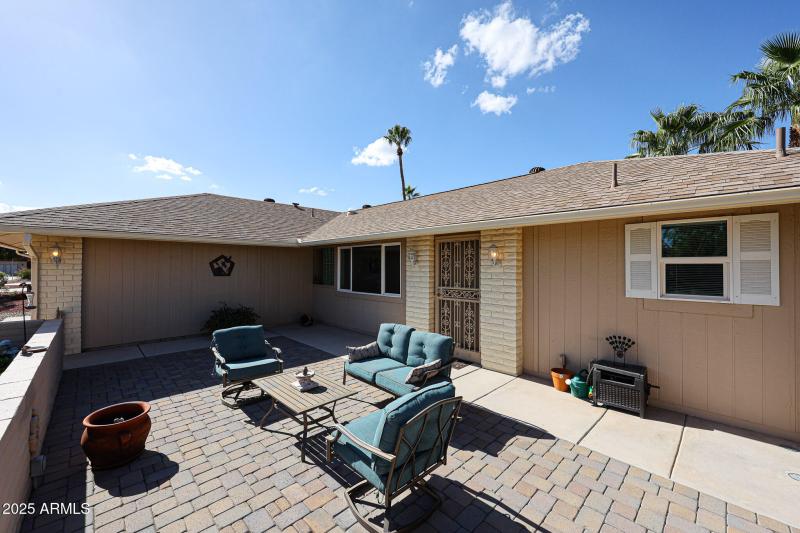 Large paved front courtyard