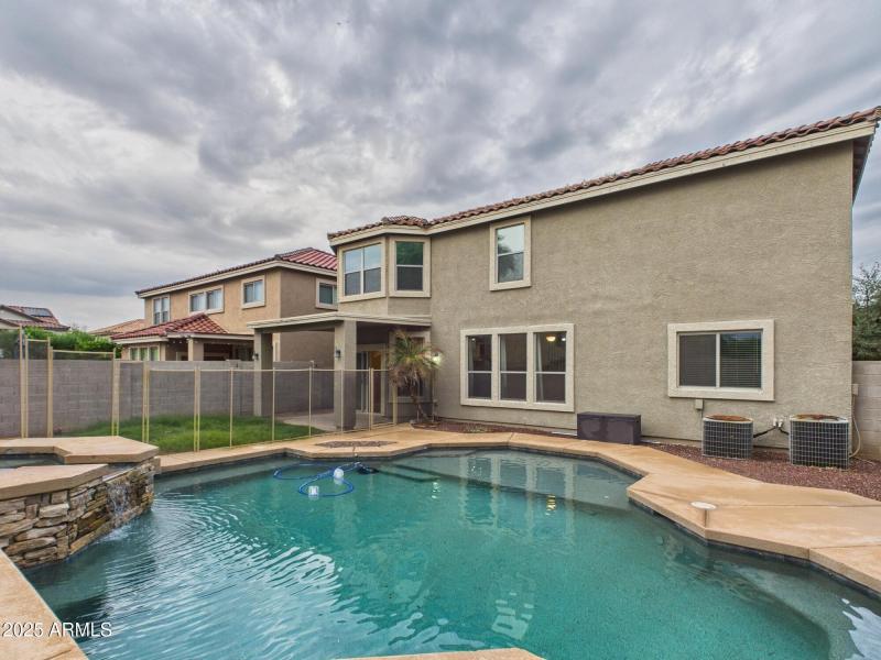 Raised spa with spillover