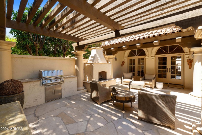 Garden With Fireplace and BBQ