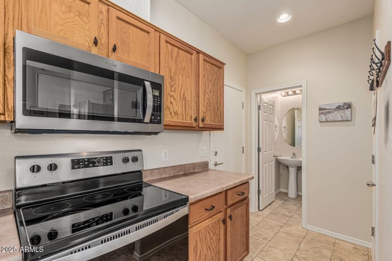 12-Kitchen into Downstairs Half Bath