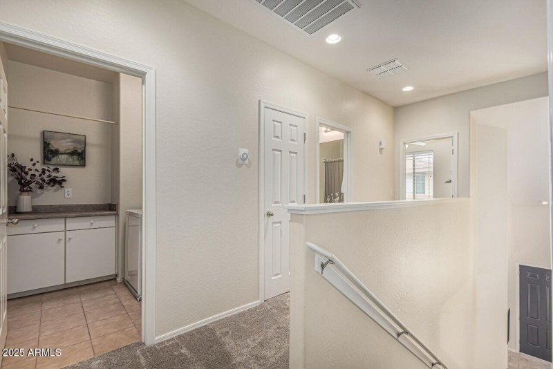 21-Upstairs Landing into Laundry Room