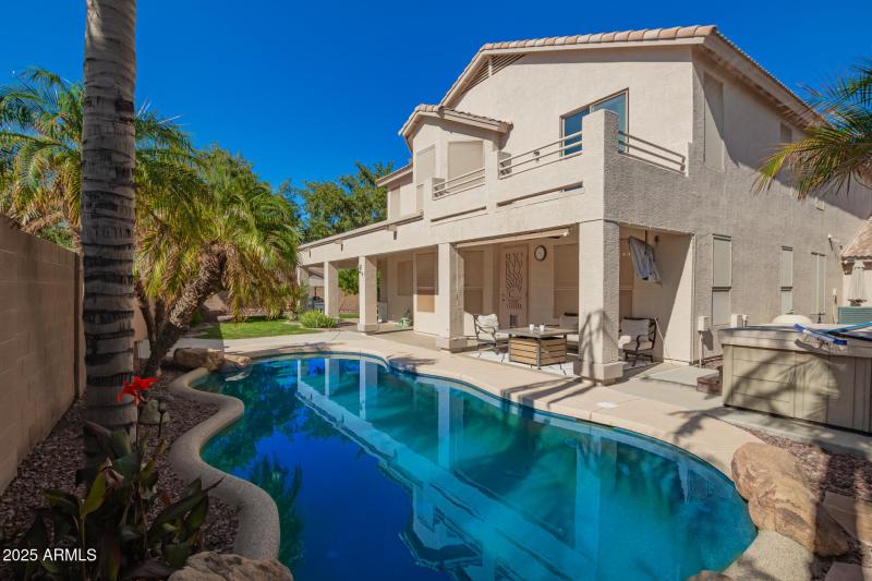 PebbleTec pool with baja step