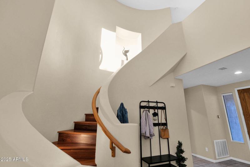 Staircase to primary suite