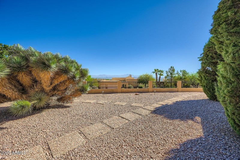 Side Yard Perfect for Another Patio Area