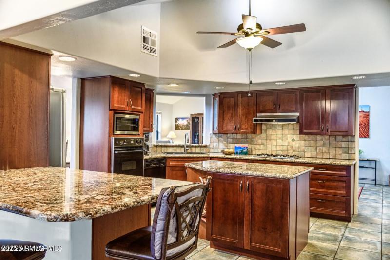 Island kitchen with granite