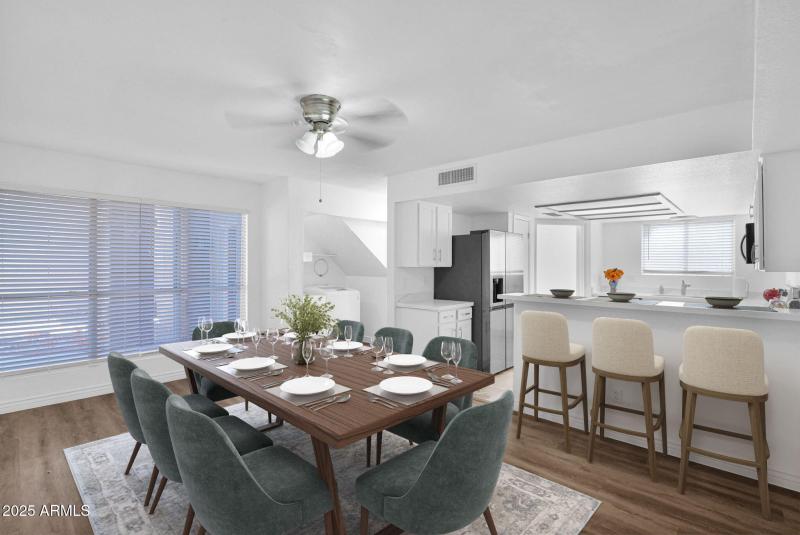 kitchen with bar table furnished