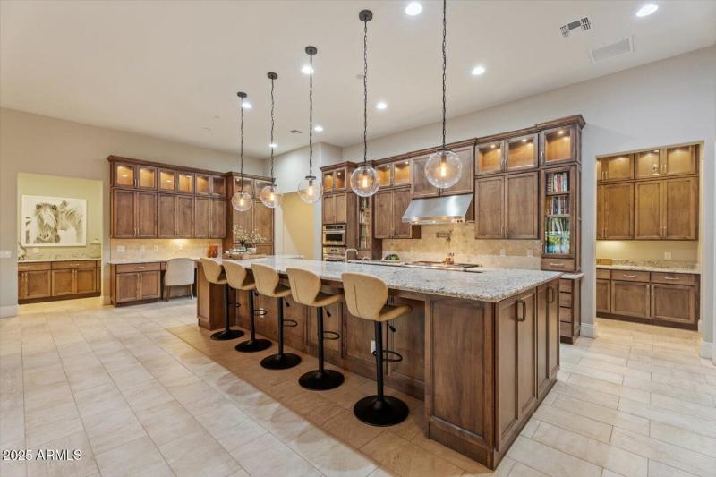 Abundant lighted upgraded cabinetry